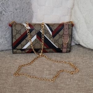 Gucci GG coated canvas Guccissima pink leather strap..Authentic..